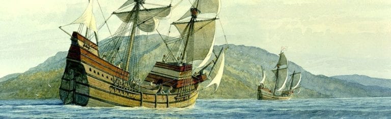 An painting of two ships sailing the waters next to a long set of green mountain ranges.