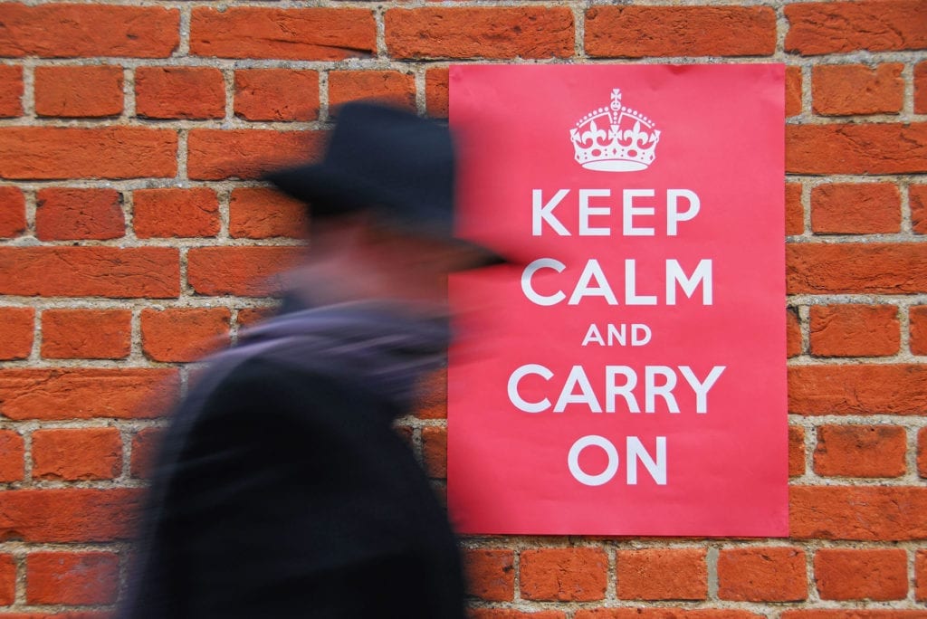 image with keep calm and carry on message on poster